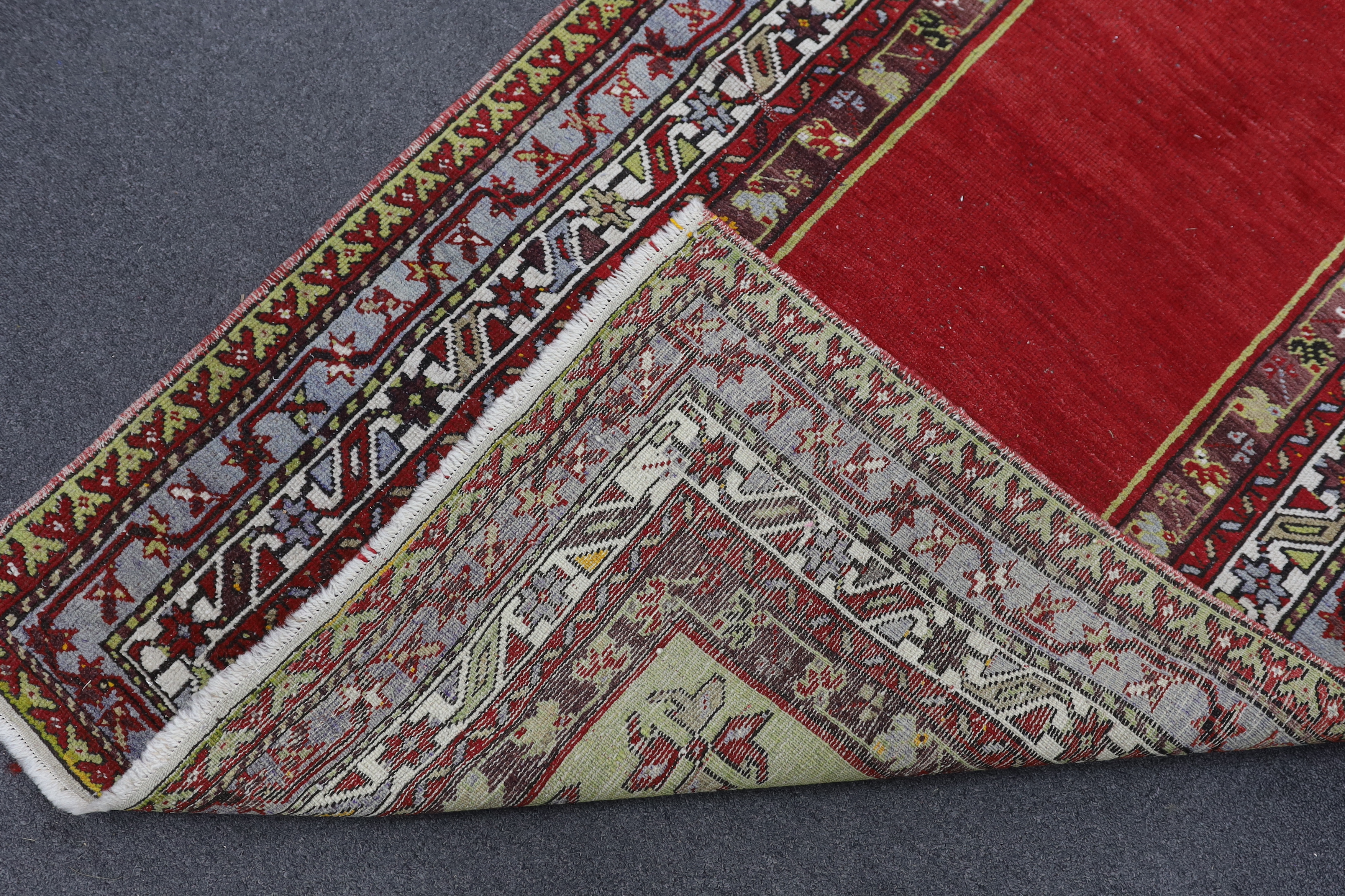 A Kesimuhsine Konya red ground prayer rug, 194 x 104cm